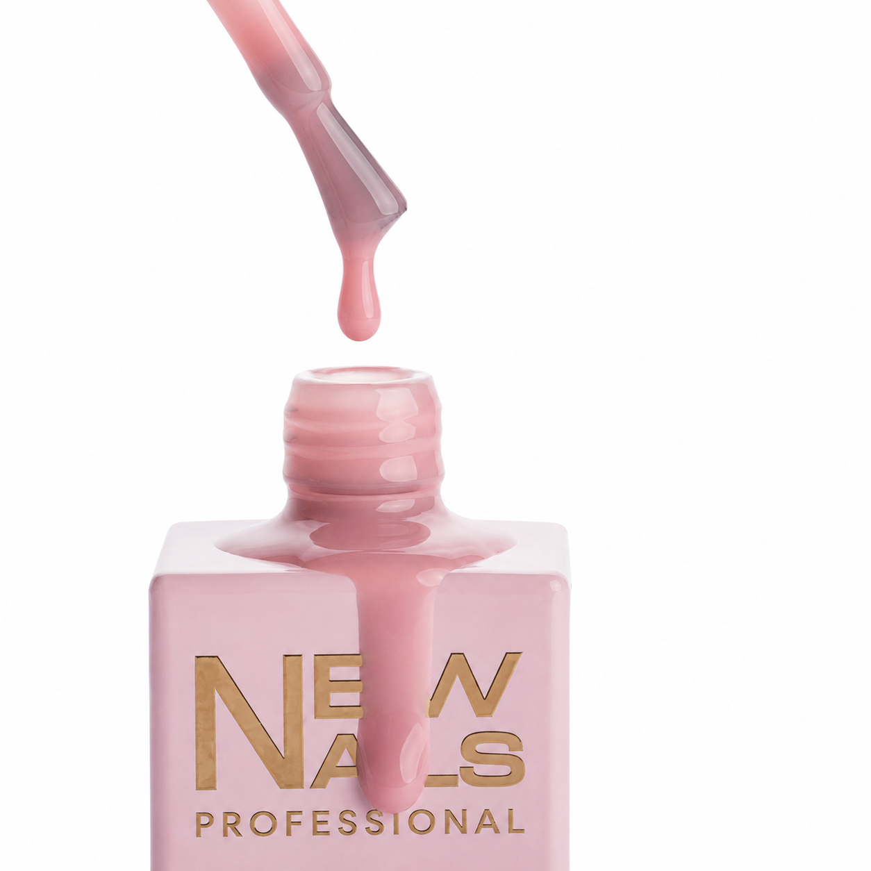 Close-up of Builder Base Gel Perfect Nude showing the self-leveling nude gel texture and brush with a drop of product by New Nails Professional
