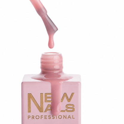 Close-up of Builder Base Gel Perfect Nude showing the self-leveling nude gel texture and brush with a drop of product by New Nails Professional