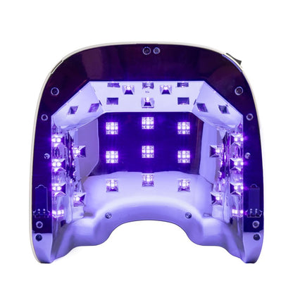NEW NAILS Professional 80W Rechargeable UV/LED nail lamp, glowing purple, perfect for gel nail curing