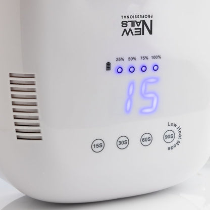 Close-up of NEW NAILS Professional Rechargeable UV/LED Nail Lamp with digital display, battery indicator, and timer buttons (15s, 30s, 60s, 90s).